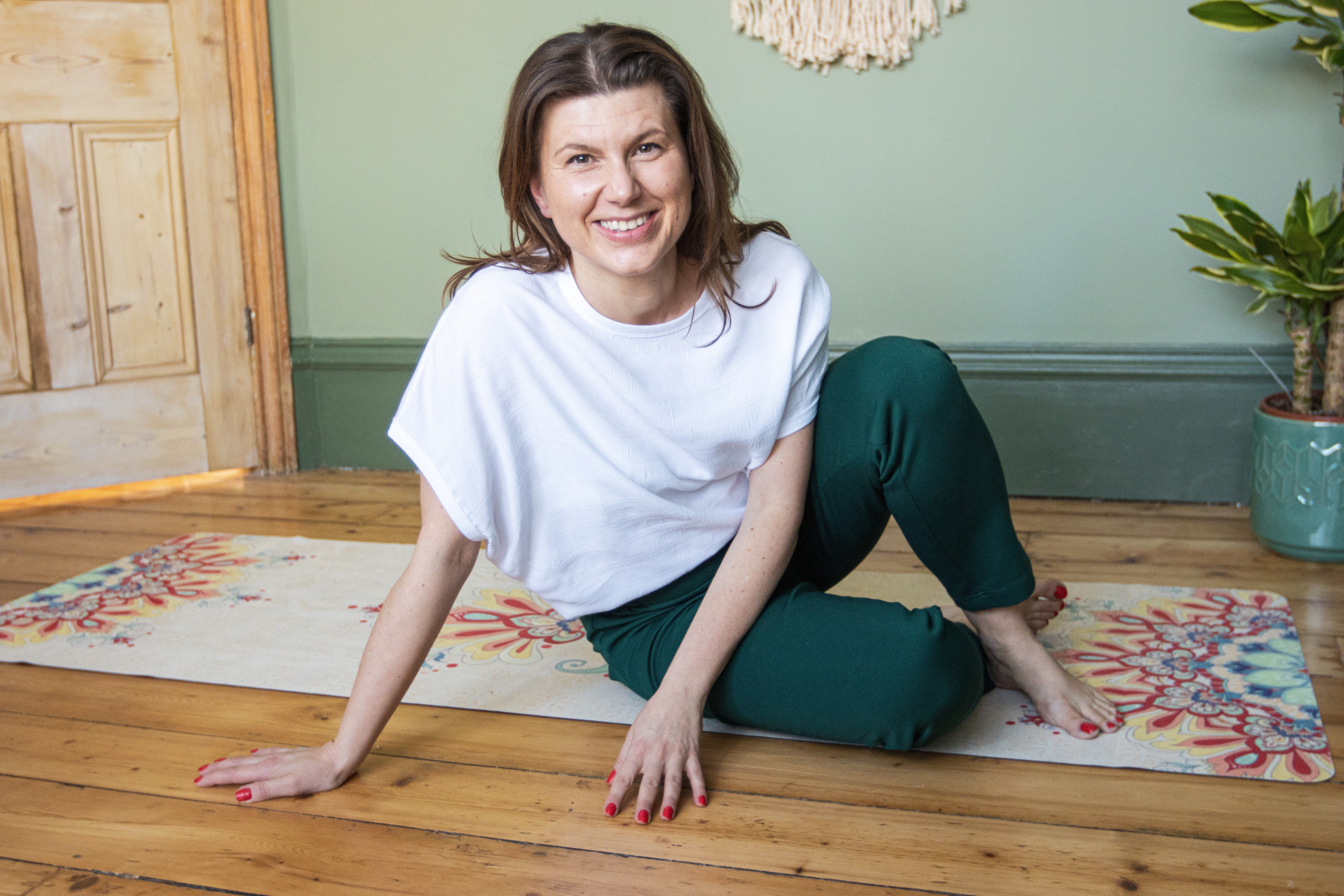 Magdalena-on-yoga-mat